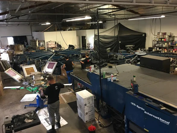 Screen printing presses on the shop floor